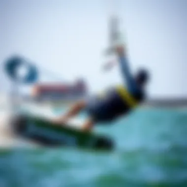 A kiteboarder wearing a harness while performing tricks on the water.