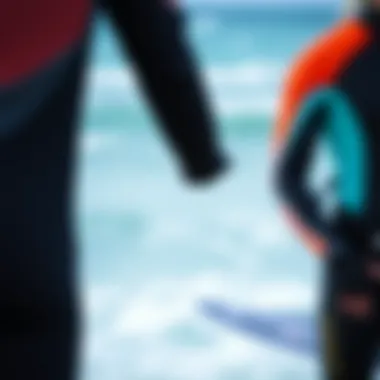 Various thickness options of wet suits displayed