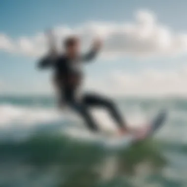 An instructor demonstrating kitesurfing techniques on the water