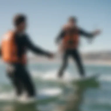 Instructor guiding a student in kitesurfing