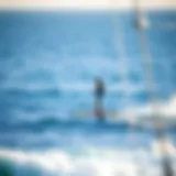 A sleek surf hydrofoil gliding above the water's surface.