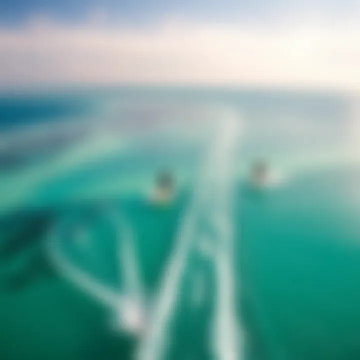 Aerial view of kiteboarders navigating crystal clear waters in an exotic location