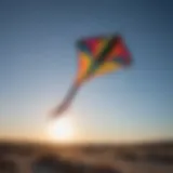 A vibrant custom kite soaring against a clear blue sky