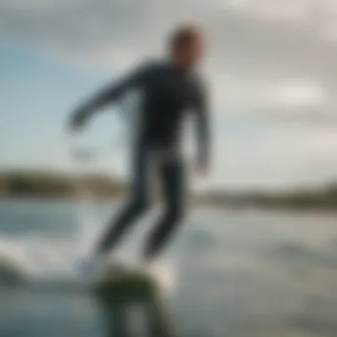 Kiteboarder wearing a wetsuit in action