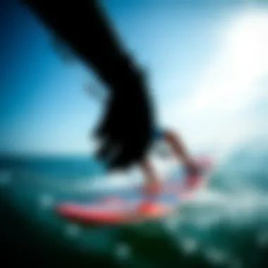 Kiteboarder wearing 3mm gloves in action on the water