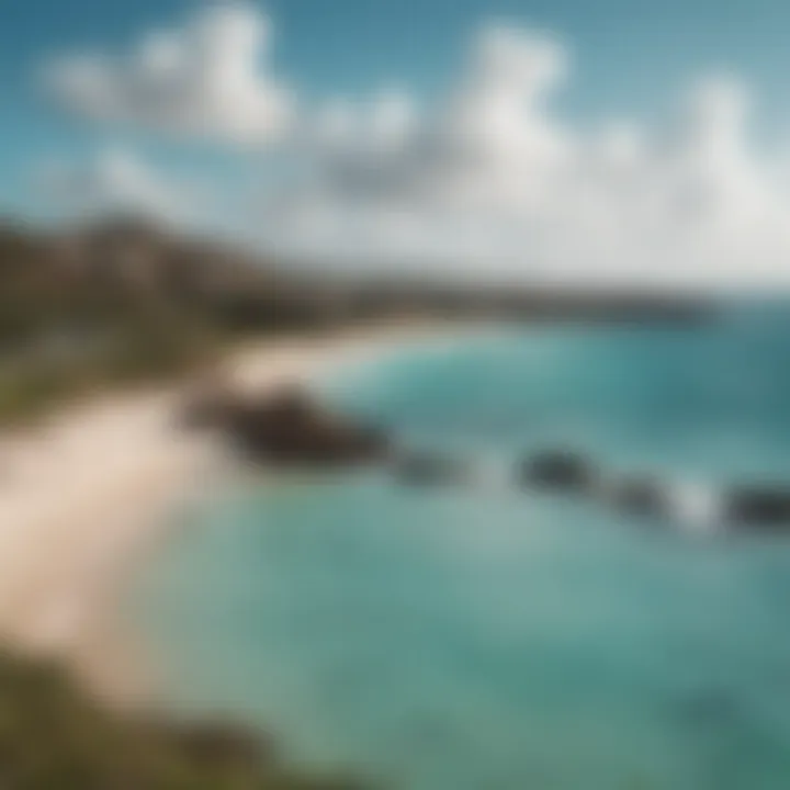 A picturesque view of Aruba's coastline with kitesurfers in the distance