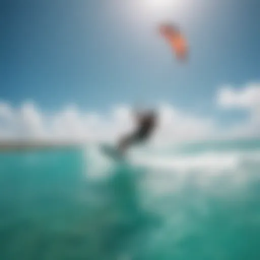 A vibrant kitesurfer gliding over turquoise waters under a clear blue sky in Aruba