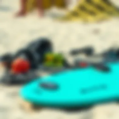 Essential Kiteboarding Gear on the Sand Essential kiteboarding gear laid out on the sand