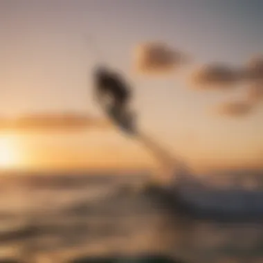 Kiteboarders riding the waves against a sunset backdrop