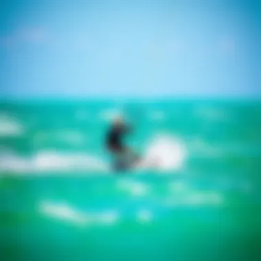 Dynamic Kiteboarding in Cocoa Beach A kiteboarder navigating the vibrant waters of Cocoa Beach