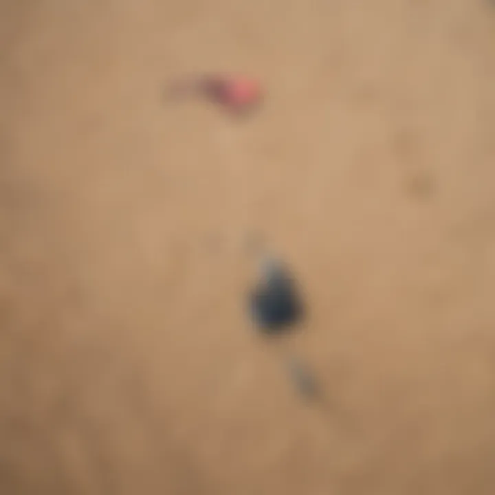 An array of 10m kites laid out for comparison on the beach