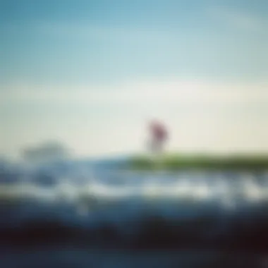 Kiteboarder performing chop hop over waves