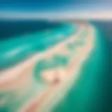 Aerial view of El Cuyo beach showcasing the stunning turquoise waters and golden sands ideal for kiteboarding.