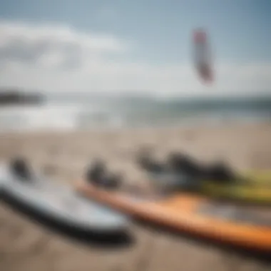 Kiteboarding equipment laid out on the shore of Greenwich Bay.