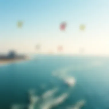 An aerial view of a kiteboarding hotspot showcasing the vast water and kites in motion