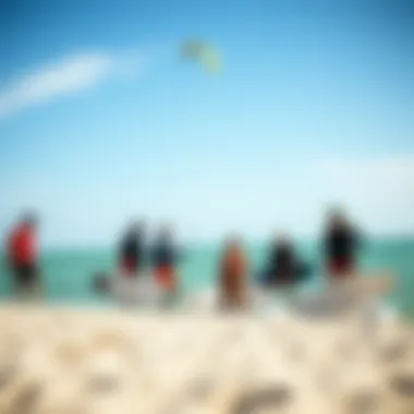 A group of kiteboarders sharing tips and experiences on the shore