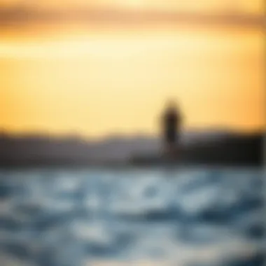 Scenic view of hydrofoiling at sunset on tranquil waters