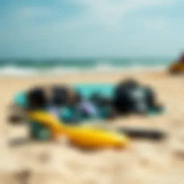 Essential Safety Gear for Kiteboarding Safety equipment laid out on the sandy beach, emphasizing essential precautions for kiteboarders.