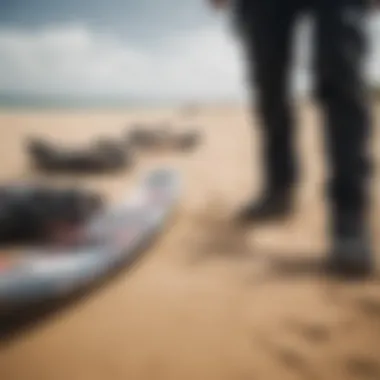 A close-up of high-quality kiteboarding gear arranged on the sandy beach, reflecting the local culture