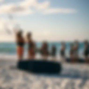 Kiteboarding community gathering at the beach with their gear.
