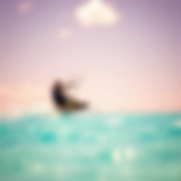 Kiteboarder gliding over turquoise waters