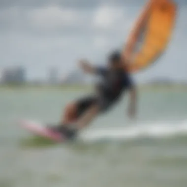 An instructor guiding a beginner during a kiteboarding lesson on Tampa's coastline