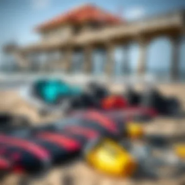 Kiteboarding Gear Essentials A close-up of kiteboarding equipment laid out on the beach next to Lake Worth Pier