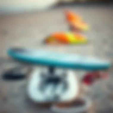 Kiteboarding gear laid out on sandy beach