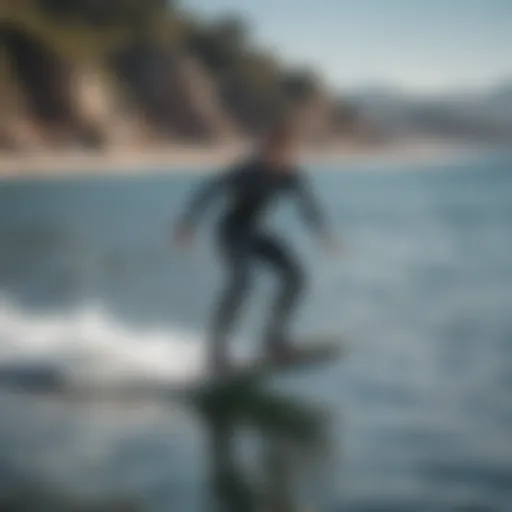 A sleek non-electric hydrofoil surfboard gliding above the water surface