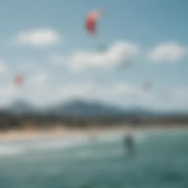 A scenic view of a kiteboarding event, highlighting the community engaged in the sport