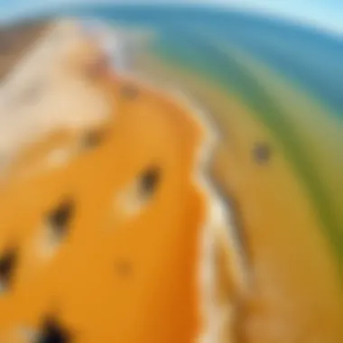 Aerial view of kiteboarders in action on vibrant waters