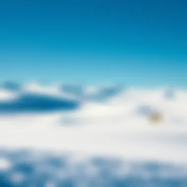 A breathtaking snowy landscape ideal for snow kiting, featuring rolling hills and clear blue skies