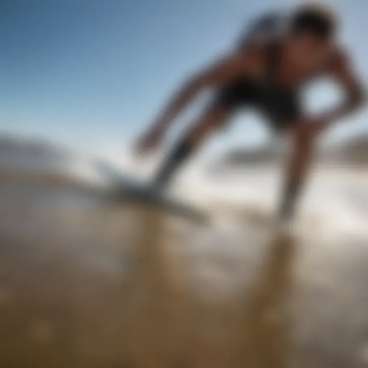 A kiteboarder applying stickybumps before riding.