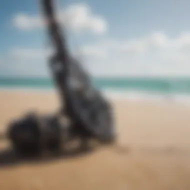 Essential kiteboarding gear displayed on the sand