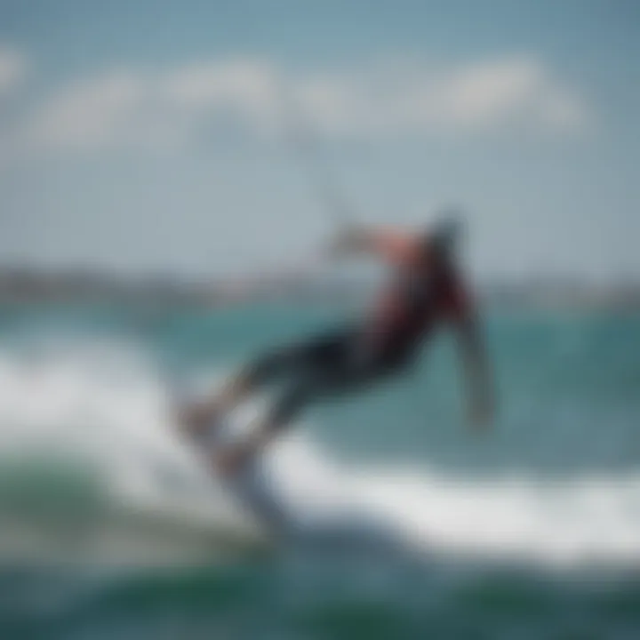 Kiteboarder utilizing a small hydrofoil in a dynamic riding position.