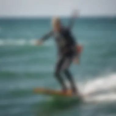 A kiteboarder expertly navigating the waves with a foil setup.