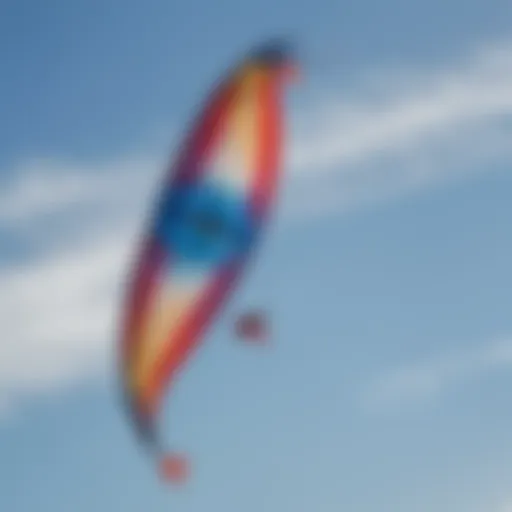 A vibrant power kite soaring against a clear blue sky, showcasing its aerodynamic design.