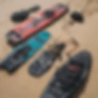 Essential kiteboarding equipment laid out on the sand