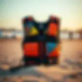 A kite vest displayed on a beach setting, showcasing its vibrant design and features.