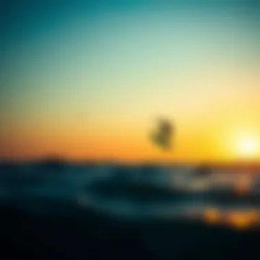 Kitesurfer soaring above the waves at sunset