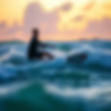 Rider navigating through waves at sunset