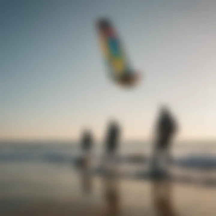 A group of kiteboarders discussing conditions by the shore