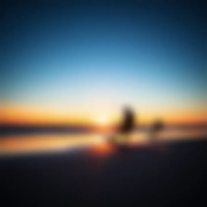 The picturesque sunset at Hardings Beach with silhouettes of kiteboards
