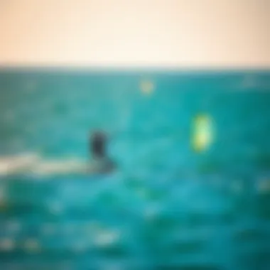 Expert Maneuvering with Hydro Foil Kite A kiteboarder expertly maneuvering a hydro foil kite in vibrant ocean setting