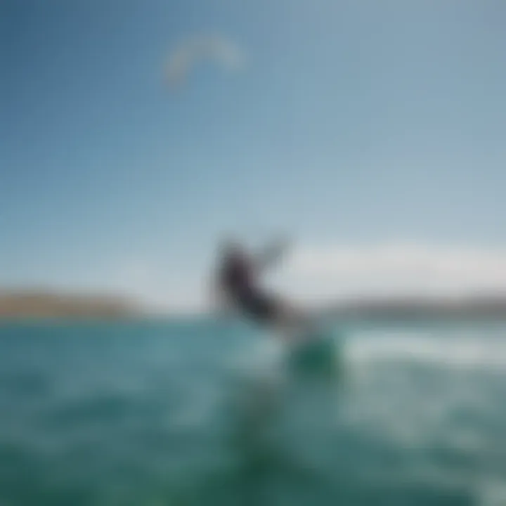 A kite surfer gliding effortlessly over the crystal-clear waters of Paros