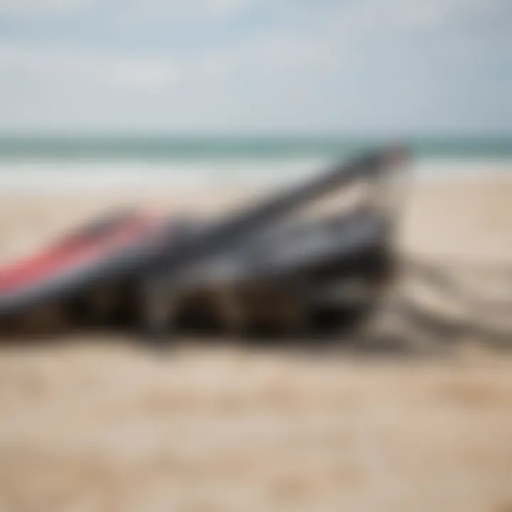 Equipment setup for kite surfing on a sandy beach in Cape Cod