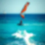 A breathtaking view of kite surfers gliding over the crystal-clear waters of Sicily.