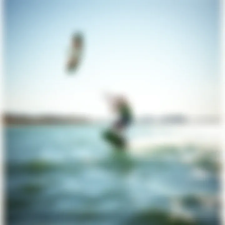 Kiteboarder gliding above water using a carbon foil, demonstrating advanced performance capabilities.