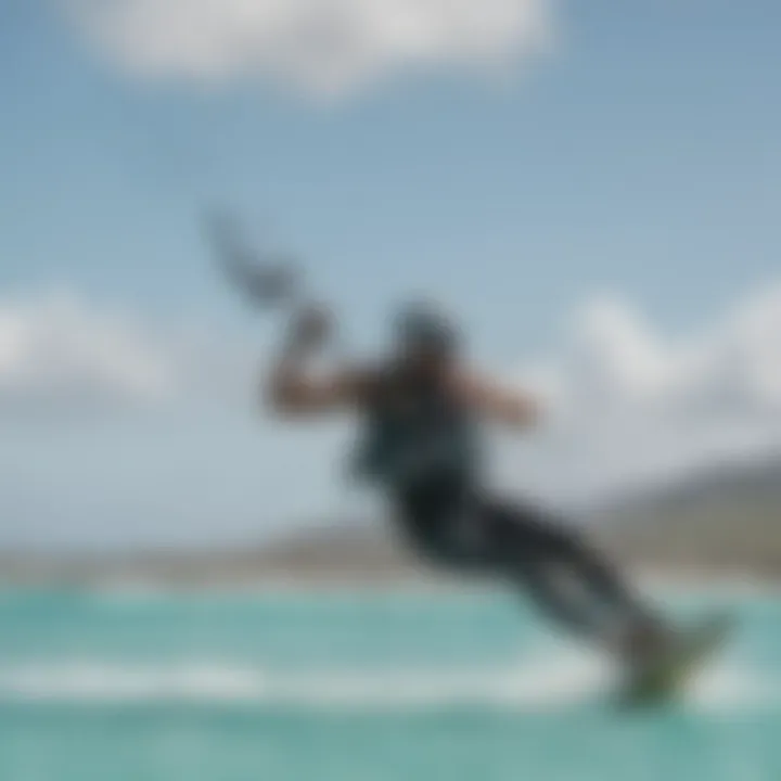 Kiteboarder gliding over turquoise waters