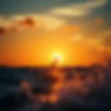 Kiteboarder gliding across the water at sunset